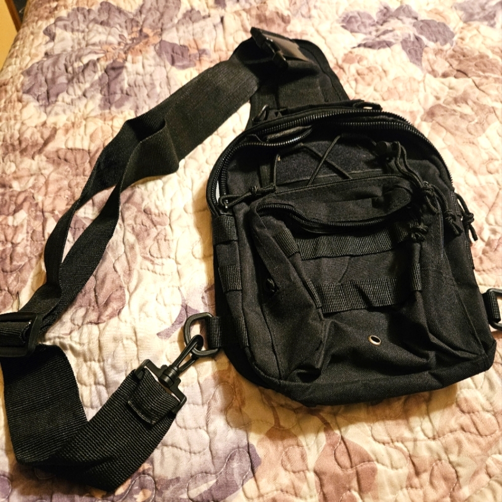 Canvas sling utility backpack